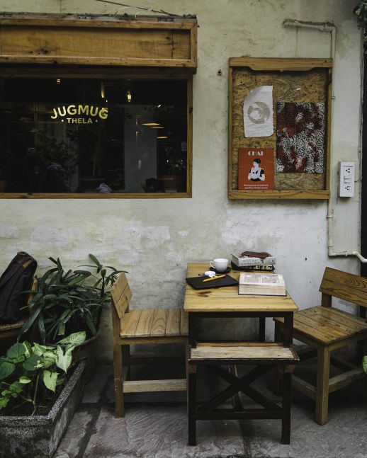 Working behind the counter at Jugmug Thela